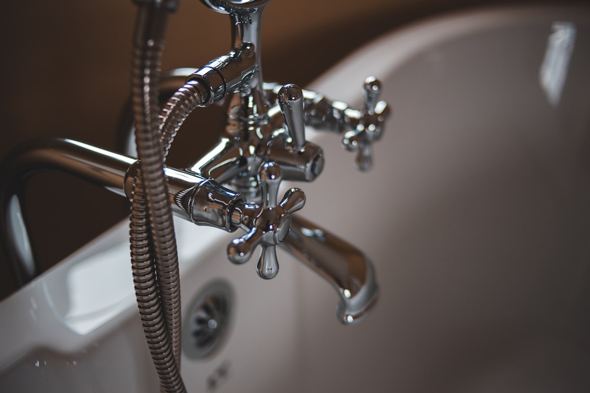Professional plumber from Bedford Plumbing Co working in Bedford